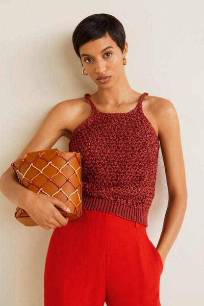 Coral red sleeveless knit cami with smocked waist and matching ankle trousers