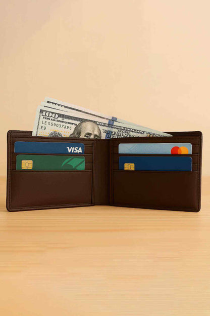 Brown leather bifold wallet open, card slots and cash compartment visible