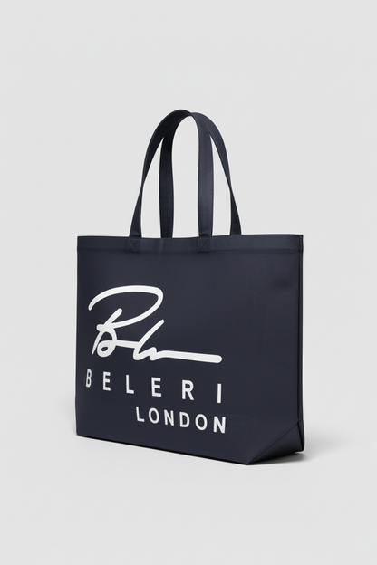 Jet black Beleri London tote bag with white script logo, angled side view