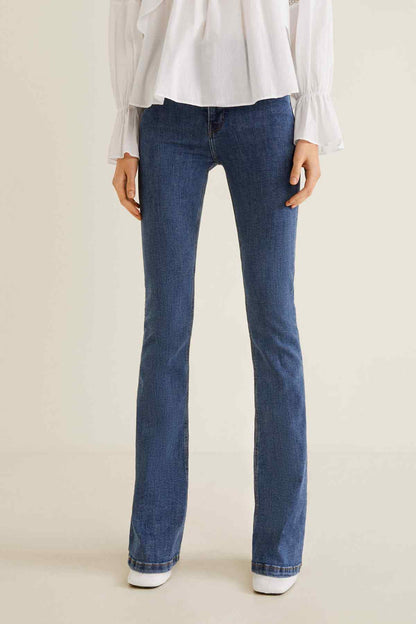 MANGO medium blue flared jeans with contrast-stitched hem and classic five-pocket design