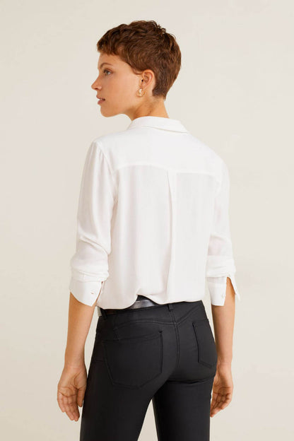 MANGO black skinny jeans, back view with seam detail and fitted leg