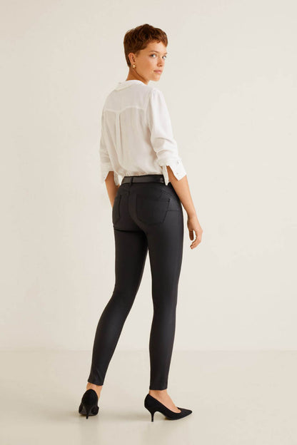 MANGO black skinny jeans with front pockets and belt loops, full-length slim legs