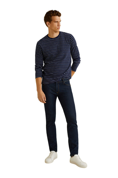 Men's navy and blue striped long-sleeve crewneck sweater on model
