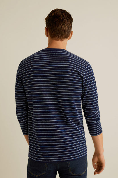 Men's navy and blue striped long-sleeve crewneck sweater, back view