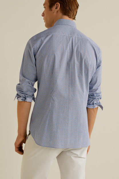 Men's blue button-up shirt back view, long sleeves, small pattern