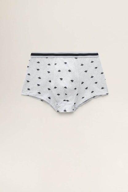Grey boxer briefs with dark waistband and small black spider pattern