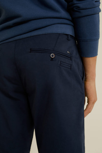 Mango navy shorts side view: belt loops and slant front pocket detail