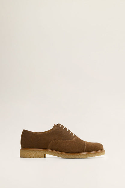 Dark brown suede lace-up shoes with stitched tan rubber sole