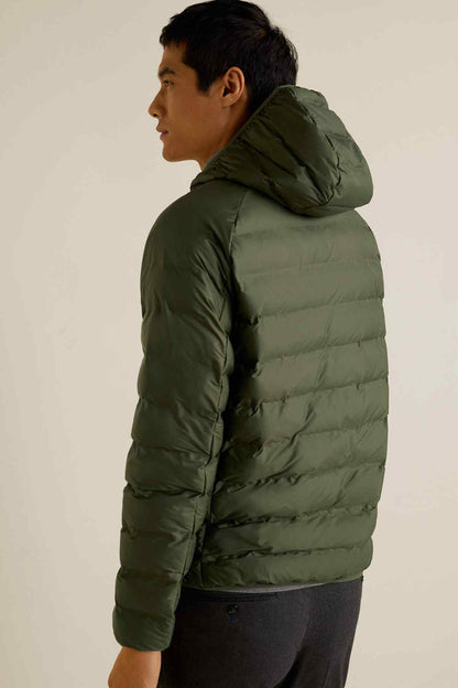 Men's olive puffer jacket with hood, side profile