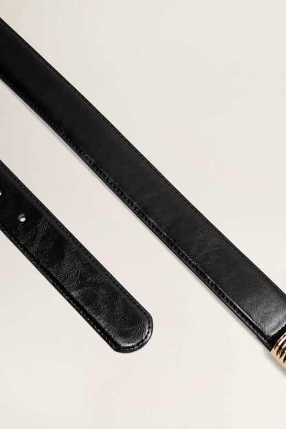 Black leather belt strap with stitched edge and metal pin holes