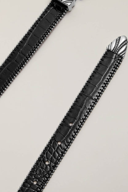 Black leather bracelet strap with silver stud trim and embossed texture
