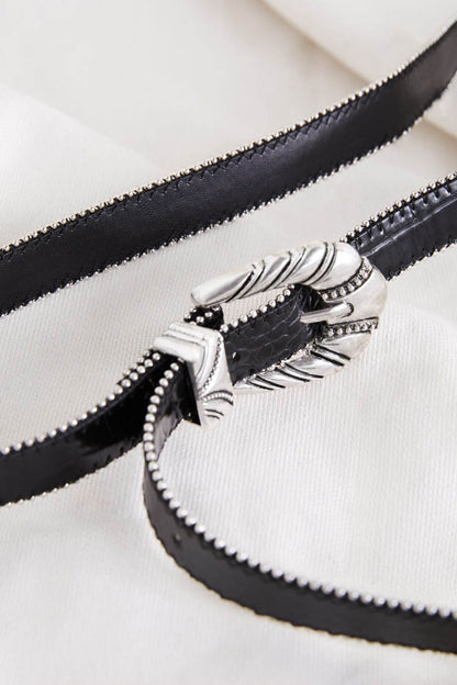 Black leather bracelet with silver feather charm and beaded stud trim