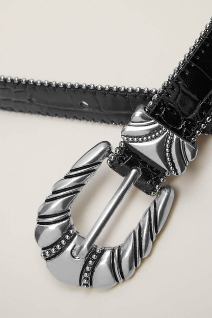Black leather bracelet with large silver feather cuff charm and studded edge