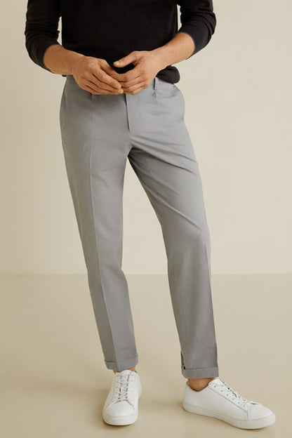 MANGO light grey trousers with zip fly, belt loops, and straight legs