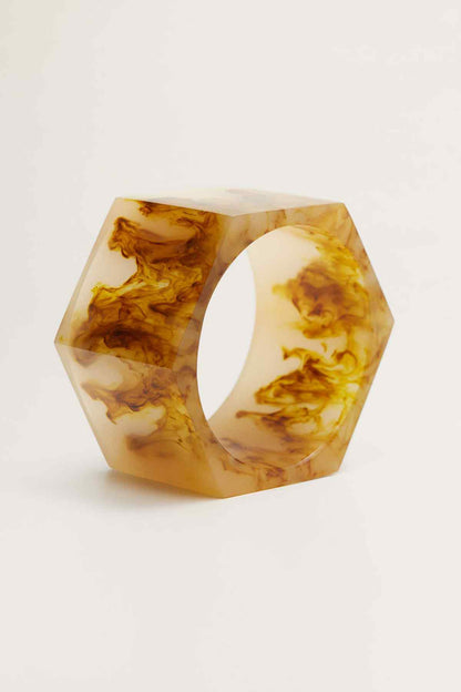 Marbled amber resin bangle bracelet, open cuff view with medium brown golden swirls