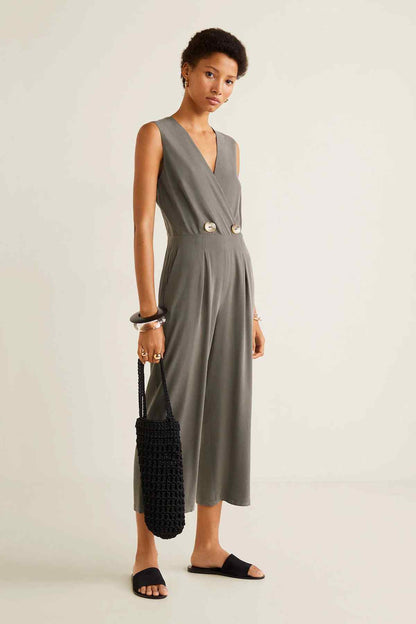Gray sleeveless V-neck jumpsuit with button waist and cropped wide legs.