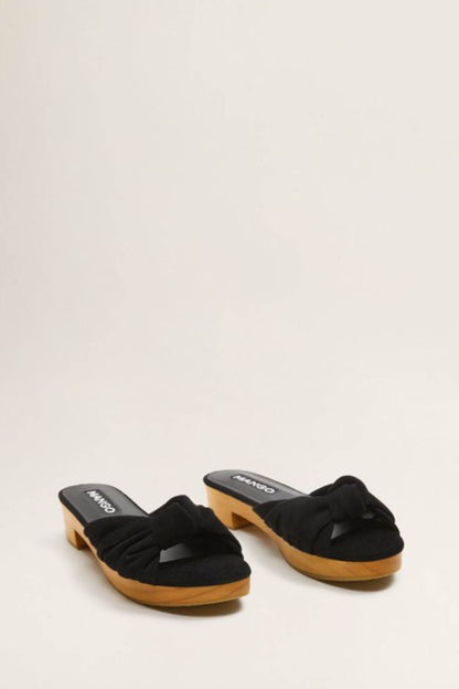 Black knot mule sandals, two-pack view, with wooden block heels