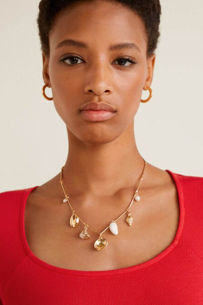Red scoop-neck knit dress with short sleeves, close-up neckline