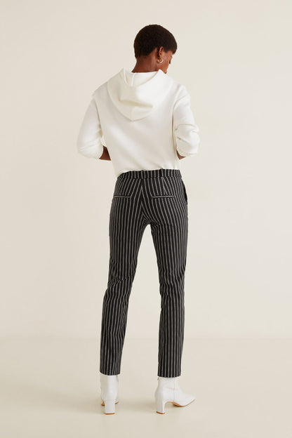 Black pinstripe trousers, slim ankle-length with back seam detail and pockets