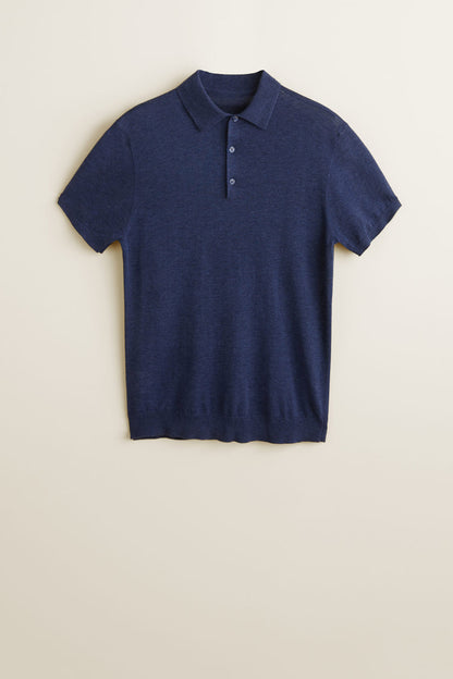 Navy knit polo shirt with short sleeves and button placket