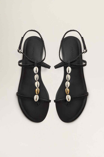 Black thong sandals with shell bead fringe on straps and gold-toned accents