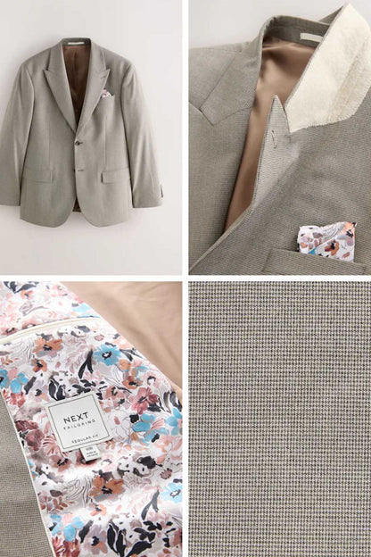 Men's light gray suit jacket and pants with floral pocket square and inner label.