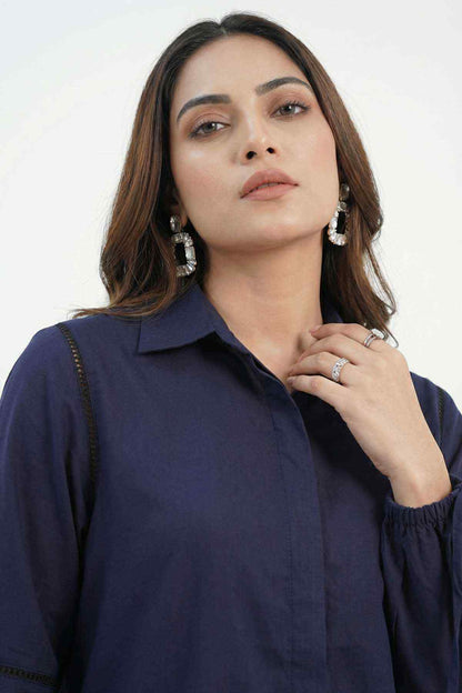 Navy blue button-up tunic shirt with collar, sleeve embroidery, and drawstring ties