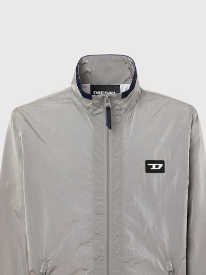 Light grey zip-up jacket with stand collar, front zipper, and chest logo patch