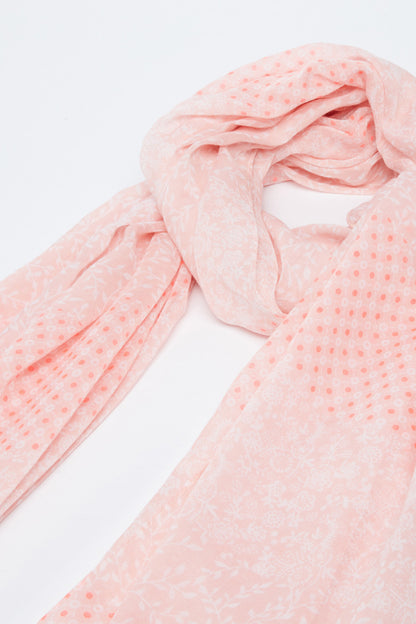 Pink patterned scarf with flowing drape and long ends