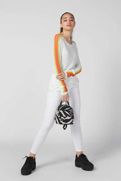 Zebra print mini bag worn crossbody with drawstring and adjustable strap