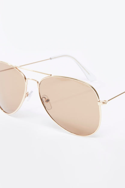 Splash sunglasses close-up: thin gold frame with peach-tinted teardrop lenses