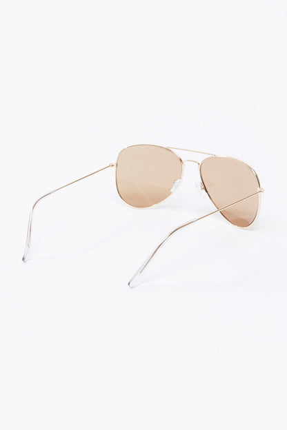 Splash sunglasses angled view with thin gold frame and peach-tinted lenses