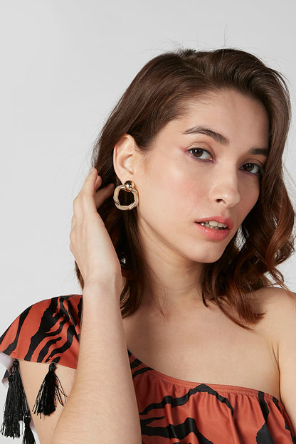 Gold beaded hoop earrings on model, round top clasp