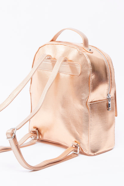 Pink rose-gold mini backpack with crossbody strap, top handle, and side zippers