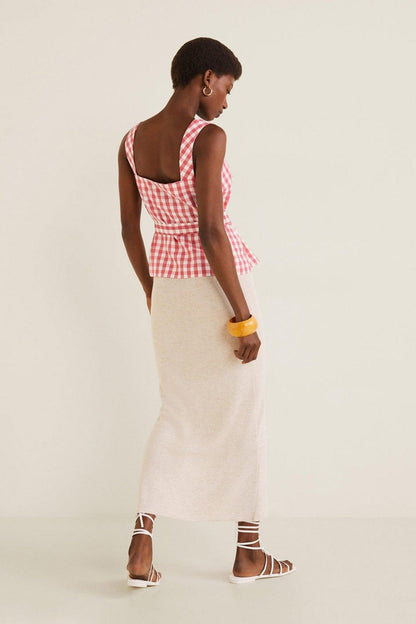 Red gingham peplum top with square neckline, seen from the back, tie waist sash