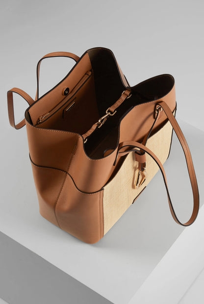 Brown and tan tote bag with open top, leather lining, and single shoulder strap