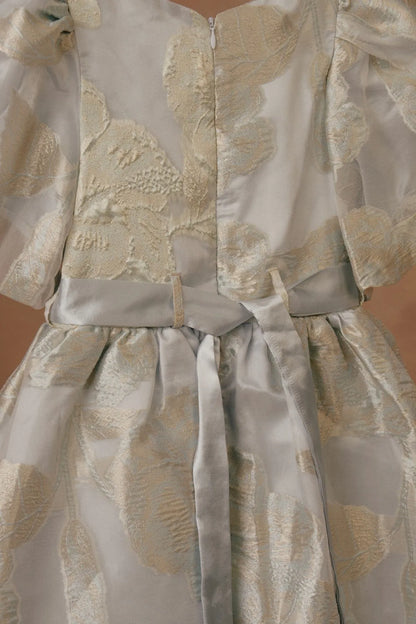 Licci girls cream dress with gold animal print, front button placket and tiered skirt