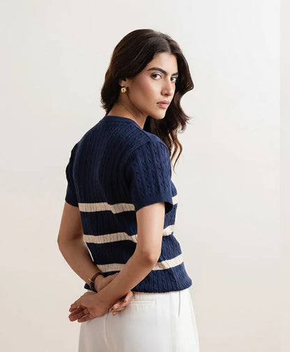 Navy cable-knit fitted top with cream stripe band, short sleeves, back/side view