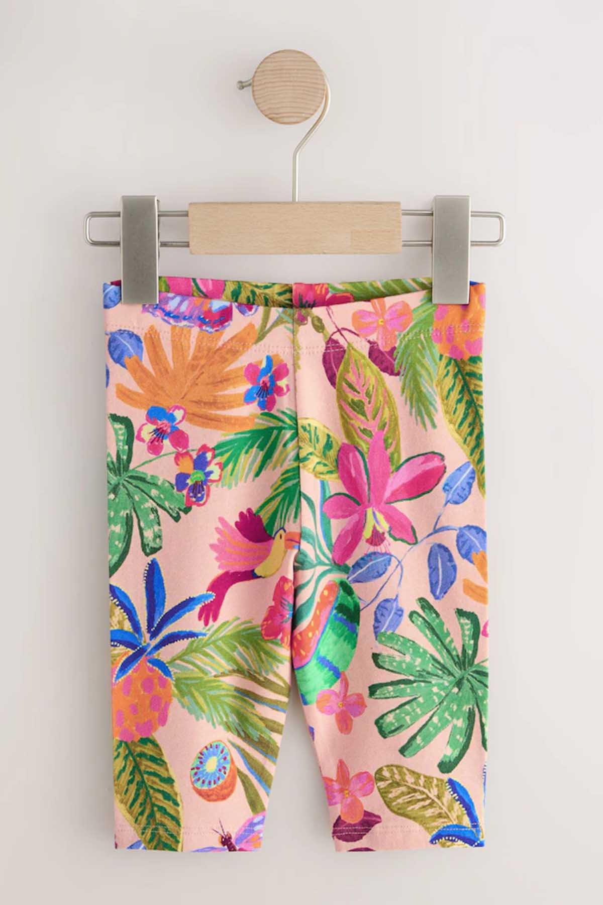 Kids' tropical floral print shorts with multicolor leaf and bird motifs