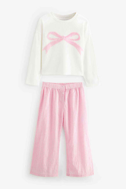Girls' white long-sleeve top with pink bow and pink striped pajama pants set