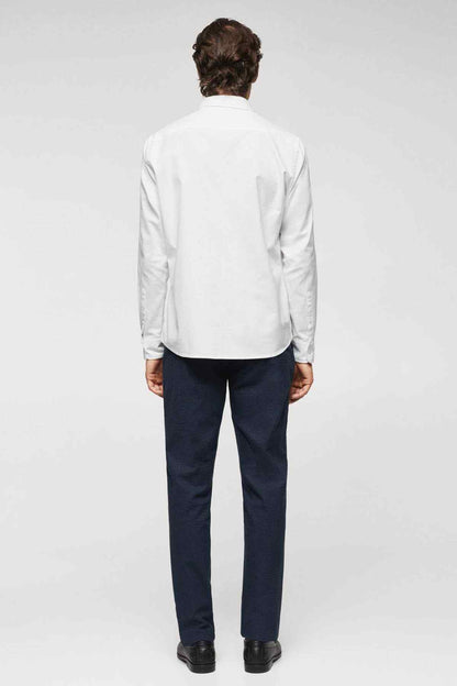 White long-sleeve button-up shirt shown from the back