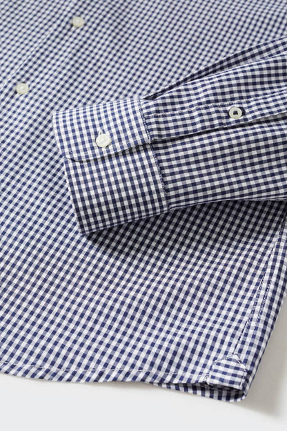 MANGO navy check cuff and placket detail, buttoned sleeve