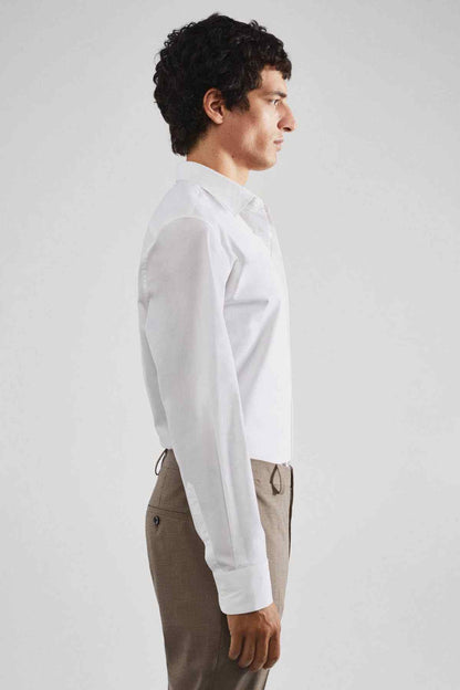MANGO white button-up dress shirt, side view, long sleeves and pointed collar