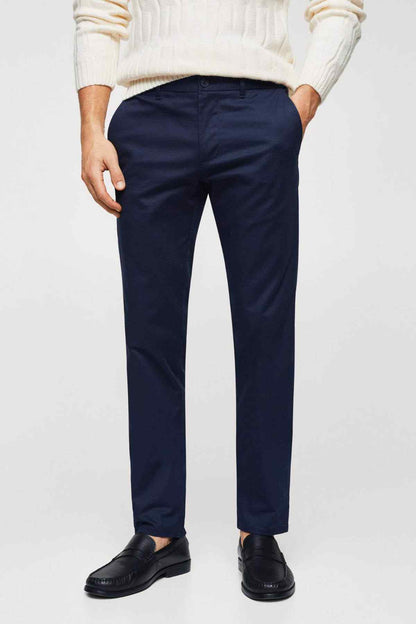 Dark navy slim-fit trousers with front button closure