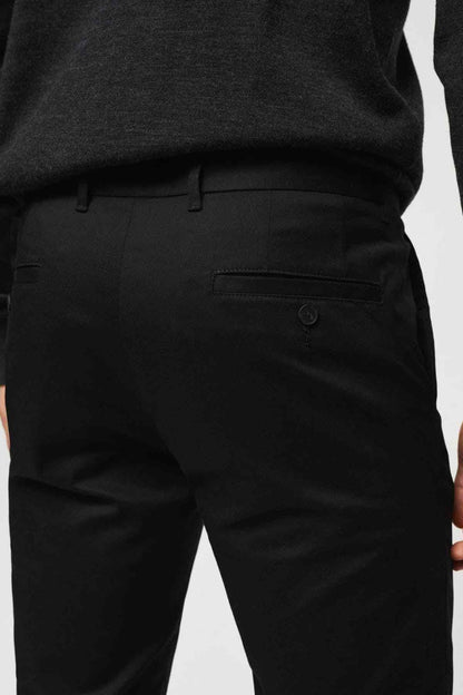 Black trousers front view with zipper fly and coin pocket