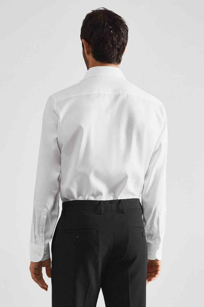 White dress shirt back view with point collar and button closure