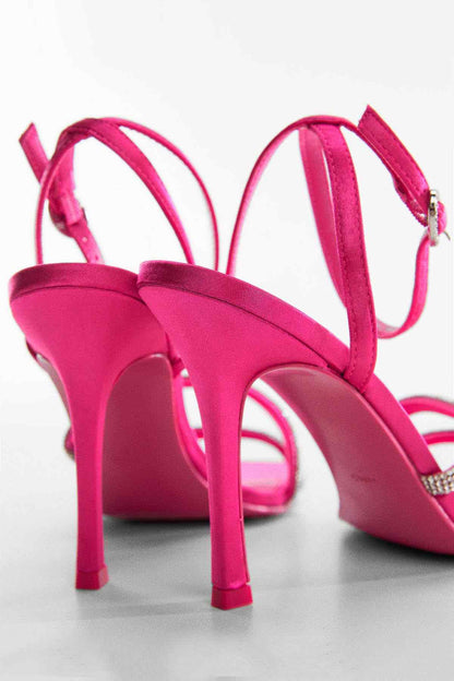 Fuchsia strappy stiletto heeled sandals with thin ankle straps