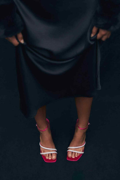 Fuchsia strappy heeled sandals with thin metallic ankle straps