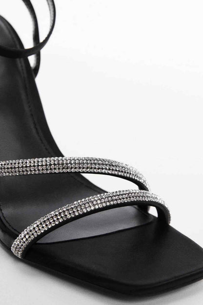 Black sandal heel strap with silver rhinestone trim