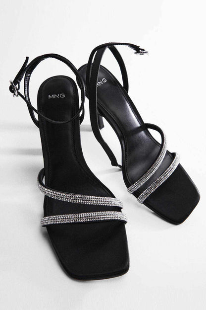 Black high-heel sandals with rhinestone band and ankle strap